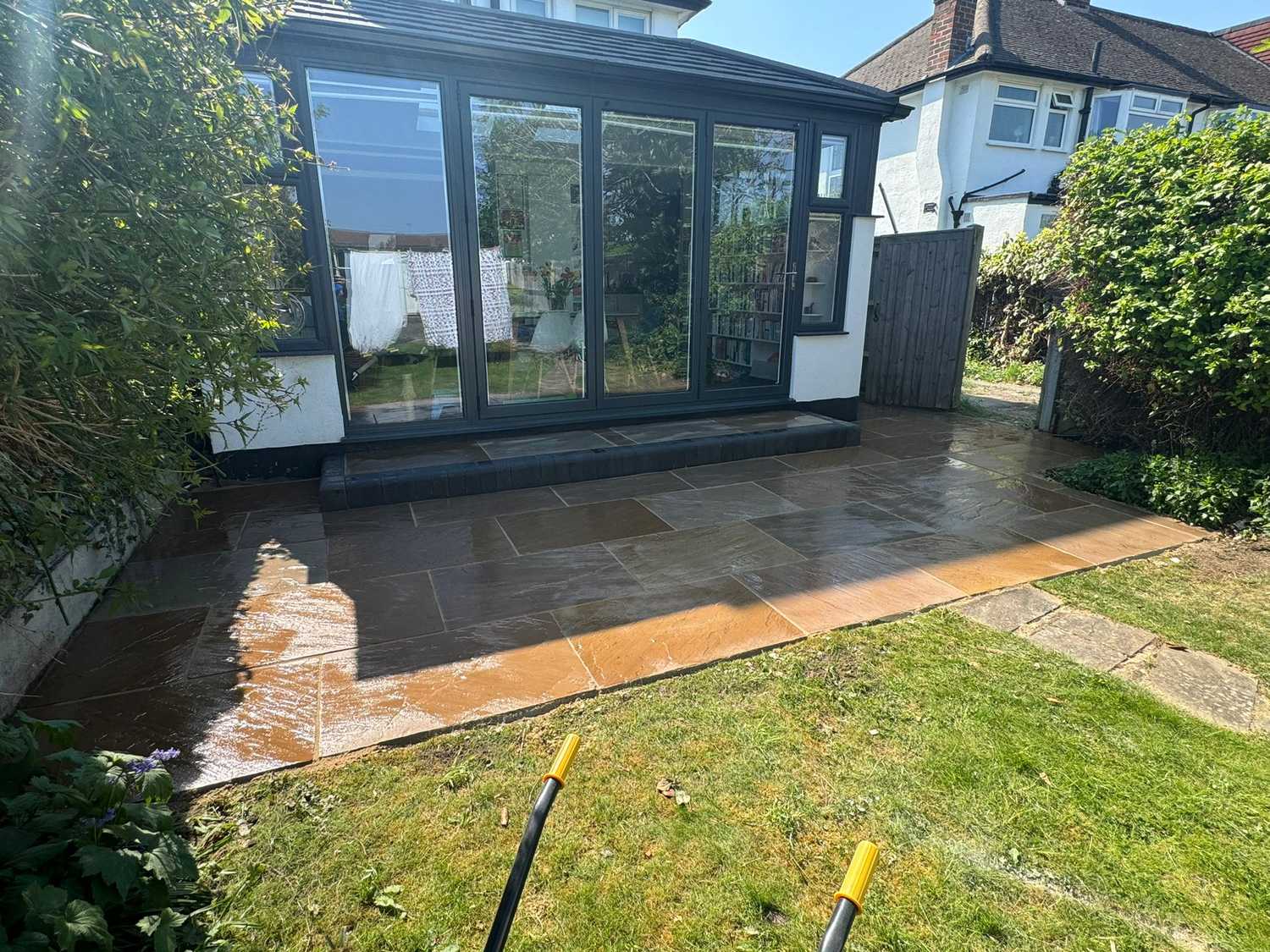 Natural stone patio and lawn