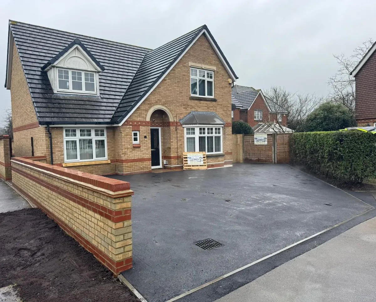 The same home with a finished block-paved driveway by T & R Paving