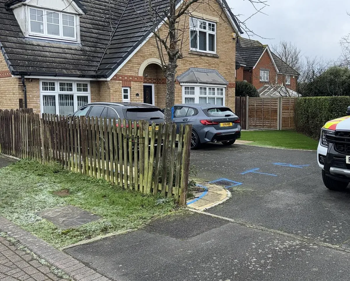 A tired, worn driveway before T & R Paving started work